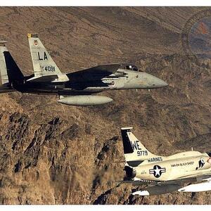 A McDonnell Douglas F-15 Eagle from Luke AFB and a VMA-214 Black Sheep A-4M Skyhawk BuNo 159779, WE 11 from MCAS El Toro, California.