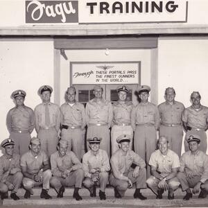 captain-slim-russell-usn-4thfromright-backrow_ron-russell.png