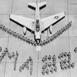 FJ-4B Fury WP-3 and squadron personnel spelling out VMA-223.